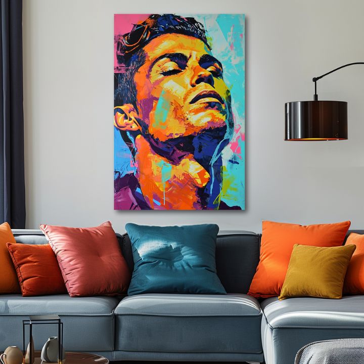 Модерна картина на платно с мотив Cristiano Ronaldo - Energia víťaza в оранжево-виолетово нюанси, енергична атмосфера, слава | Картина Cristiano Ronaldo - Energia víťaza – продукт