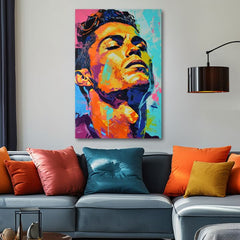 Модерна картина на платно с мотив Cristiano Ronaldo - Energia víťaza в оранжево-виолетово нюанси, енергична атмосфера, слава | Картина Cristiano Ronaldo - Energia víťaza – продукт