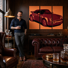 Ръчно рисувана картина POP Art PORSCHE 911 3 броя пор – картина в модерен мъжки интериор, lifestyle визуализация. Доминиращи цветове: оранжево, червено, черно.